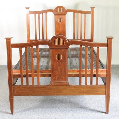 Lot 458 - An Edwardian inlaid bedstead