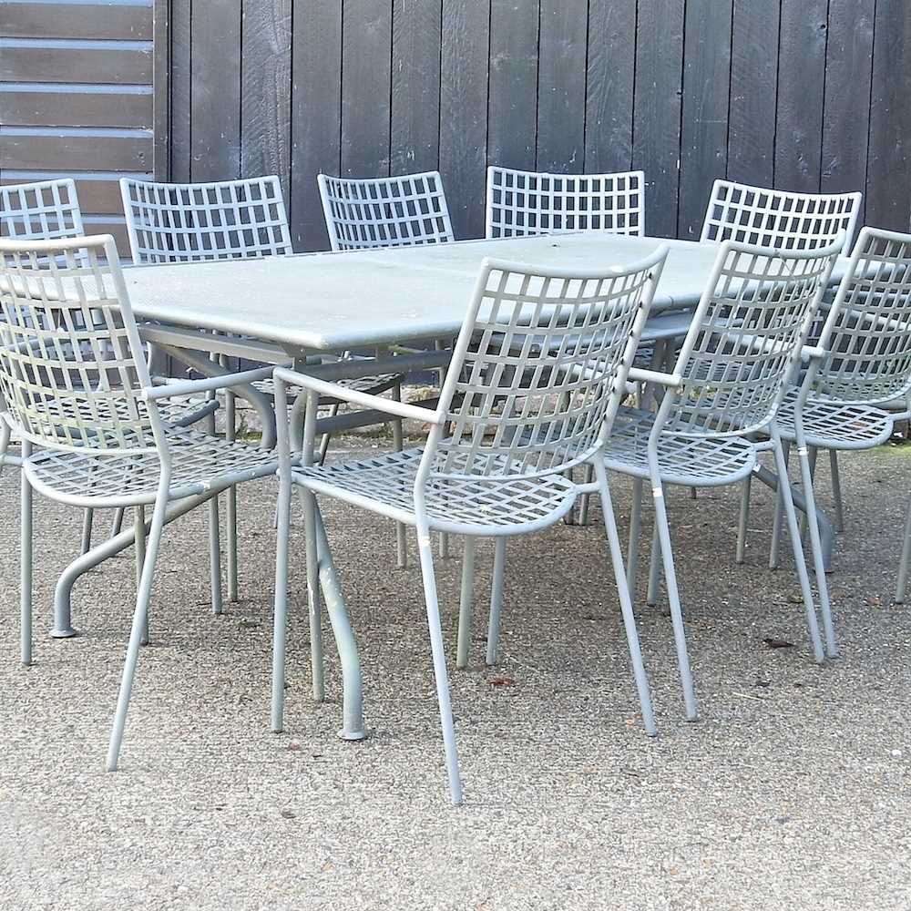 Lot 344 A metal garden table and chairs