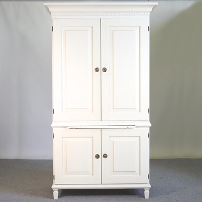 Lot 501 - A white painted wardrobe