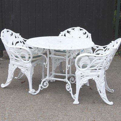 Lot 471 - A garden table and chairs