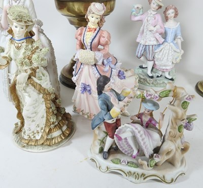 Lot 102 - A collection of continental figures