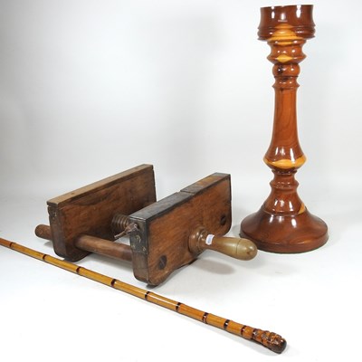 Lot 576 - A large treen candlestick