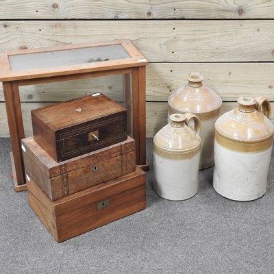 Lot 231 - A set of three stoneware jars