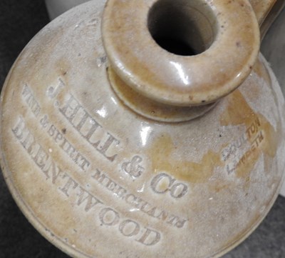 Lot 231 - A set of three stoneware jars