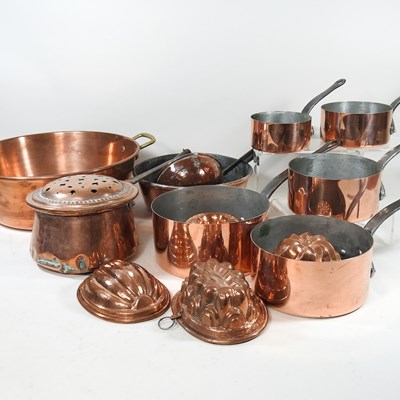 Lot 594 - A set of five graduated copper saucepans