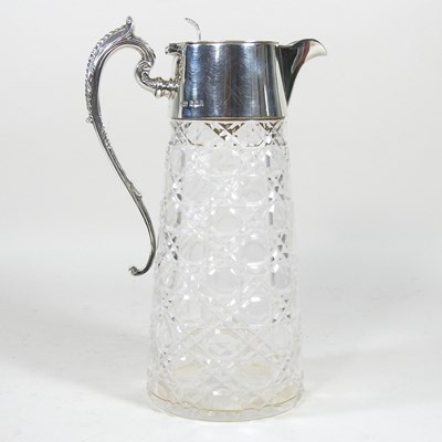 Lot 109 - An Edwardian silver mounted cut glass claret...