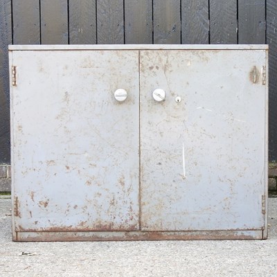 Lot 574 - A metal cabinet