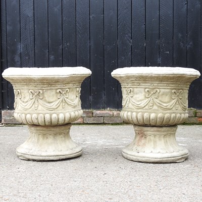 Lot 592 - A pair of garden urns