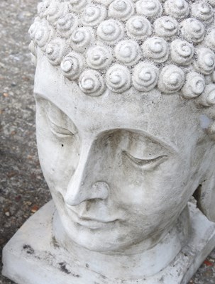 Lot 34 - Three cast stone Buddha heads