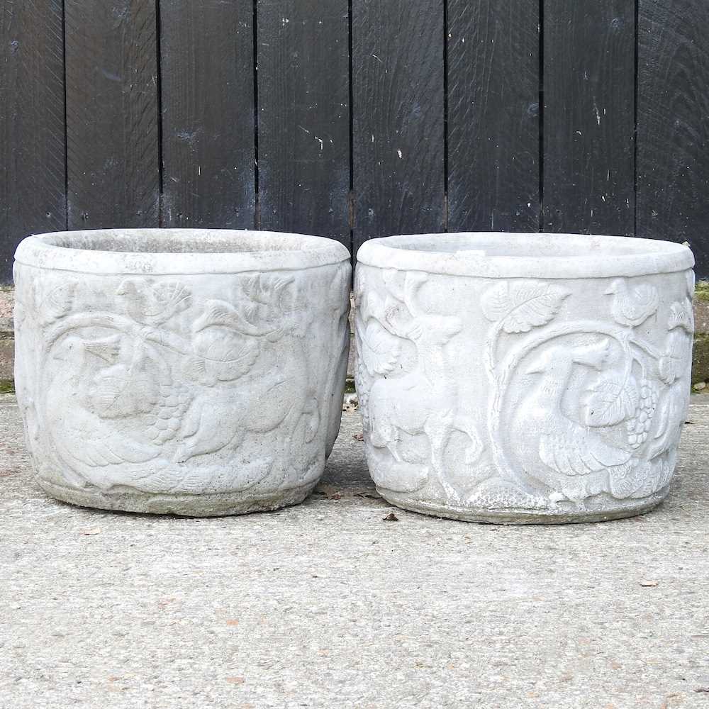 Lot 265 - Two cast stone garden pots