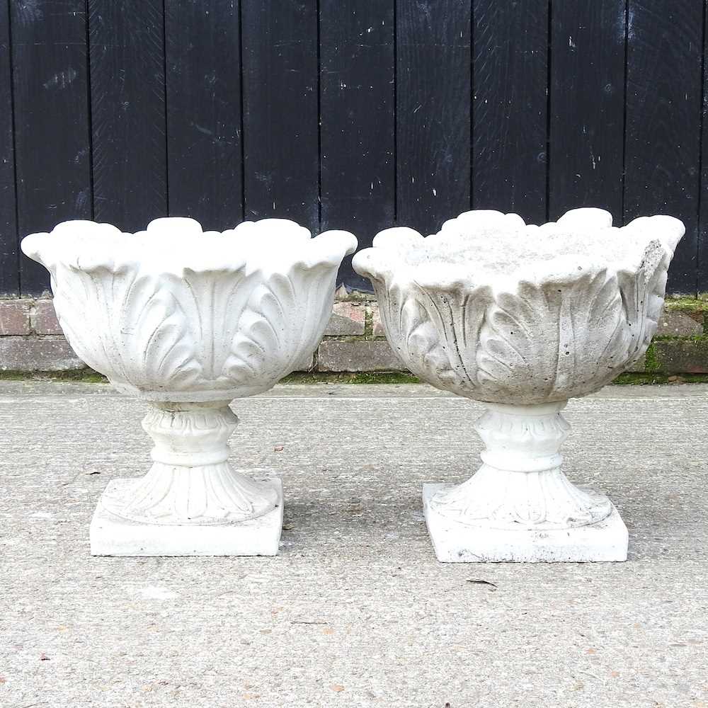 Lot 452 - A pair of garden urns