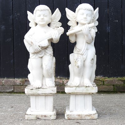 Lot 202 - Two cast marble cherubs