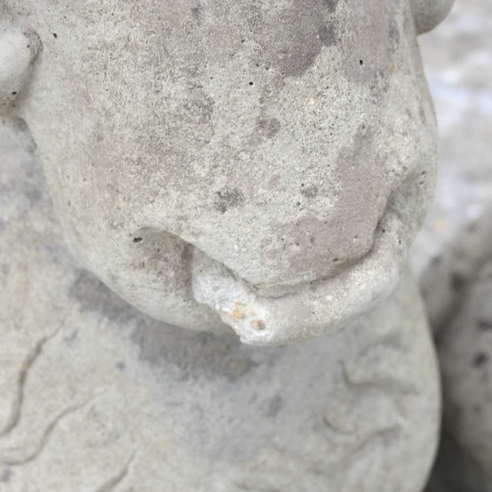 Lot 291 Three cast stone statues