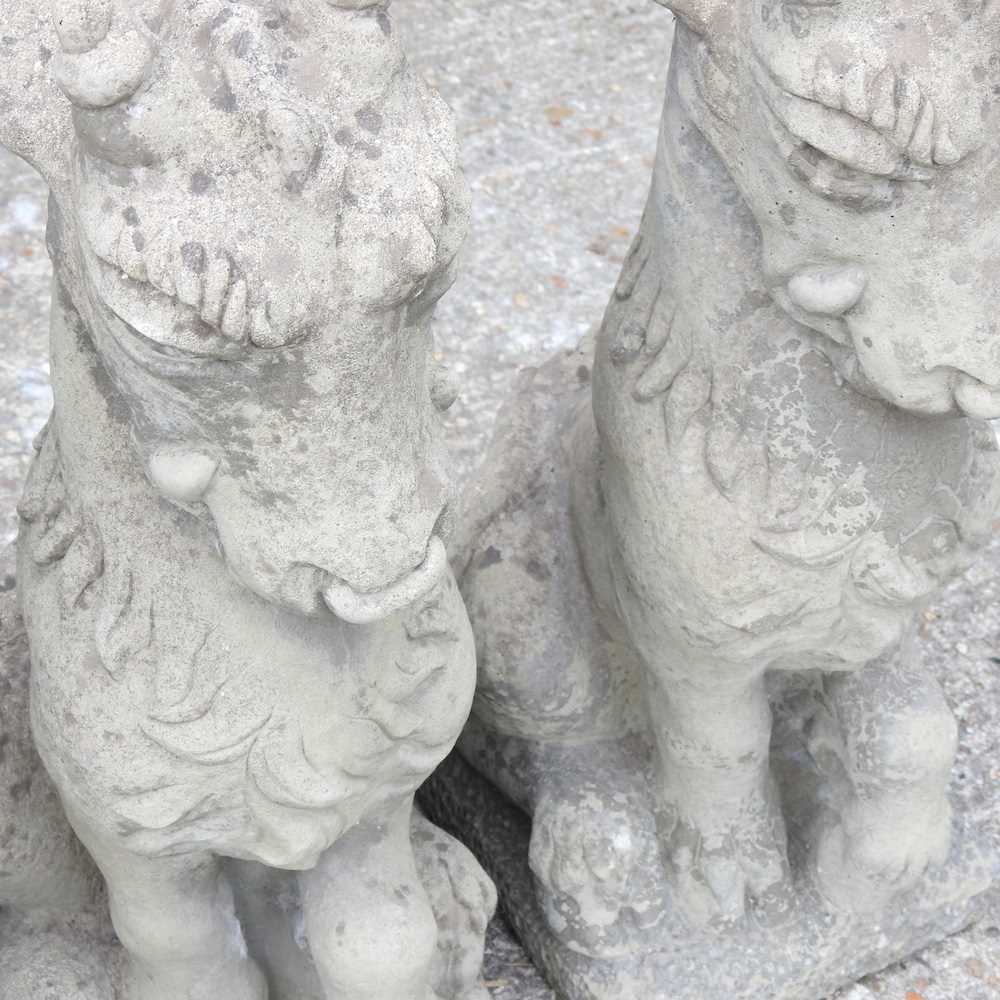 Lot 291 Three cast stone statues