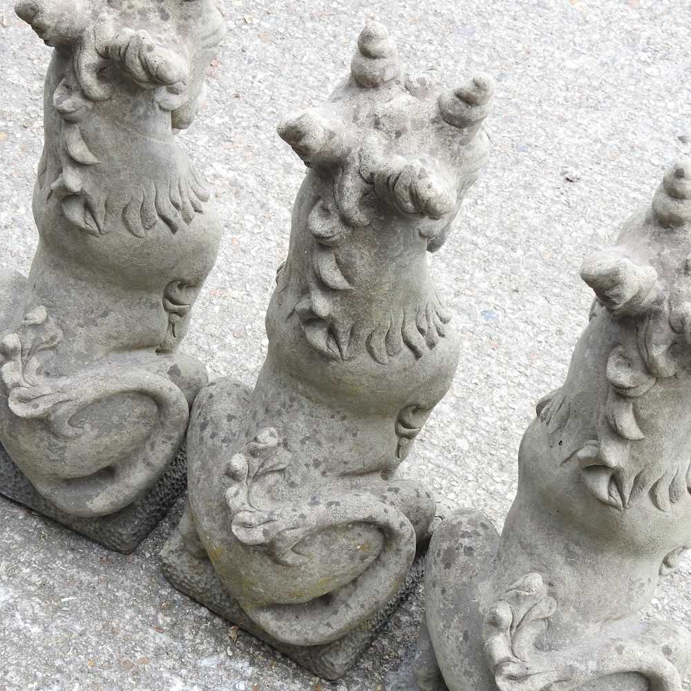 Lot 291 Three cast stone statues