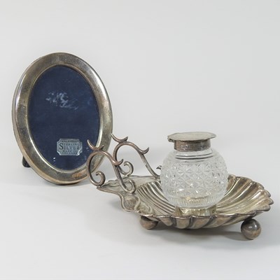 Lot 195 - An Edwardian silver and cut glass inkwell