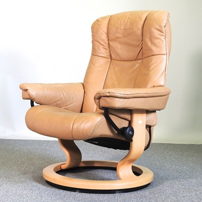 Lot 135 - A reclining armchair