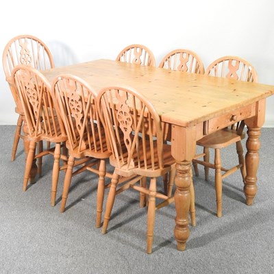 Lot 399 - A pine kitchen table and chairs