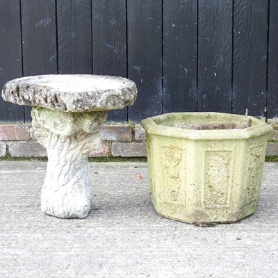 Lot 515 - A cast stone bird bath, 44cm high, together...