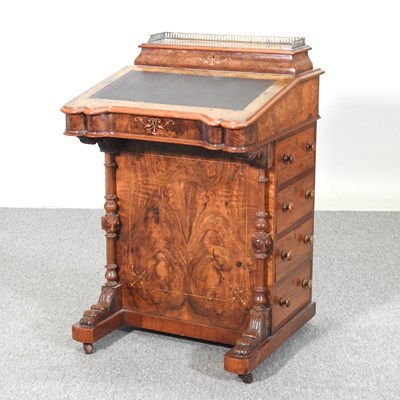 Lot 320 - A Victorian walnut davenport, with a pierced...