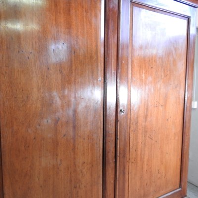 Lot 702 - A George III mahogany linen press, fitted with...