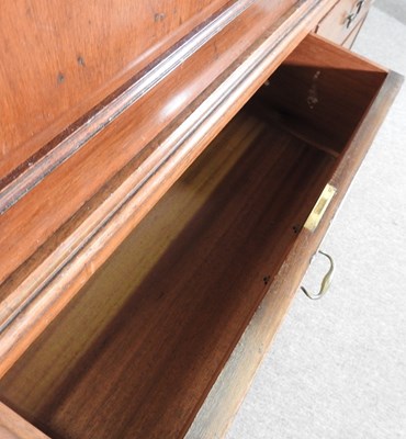 Lot 702 - A George III mahogany linen press, fitted with...
