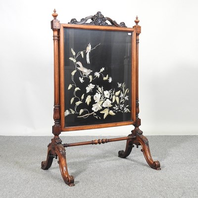 Lot 762 - A large Victorian carved walnut fire screen,...