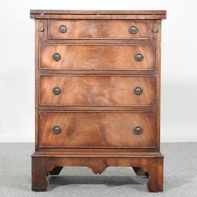 Lot 866 - A George III style bachelor's chest, with a...