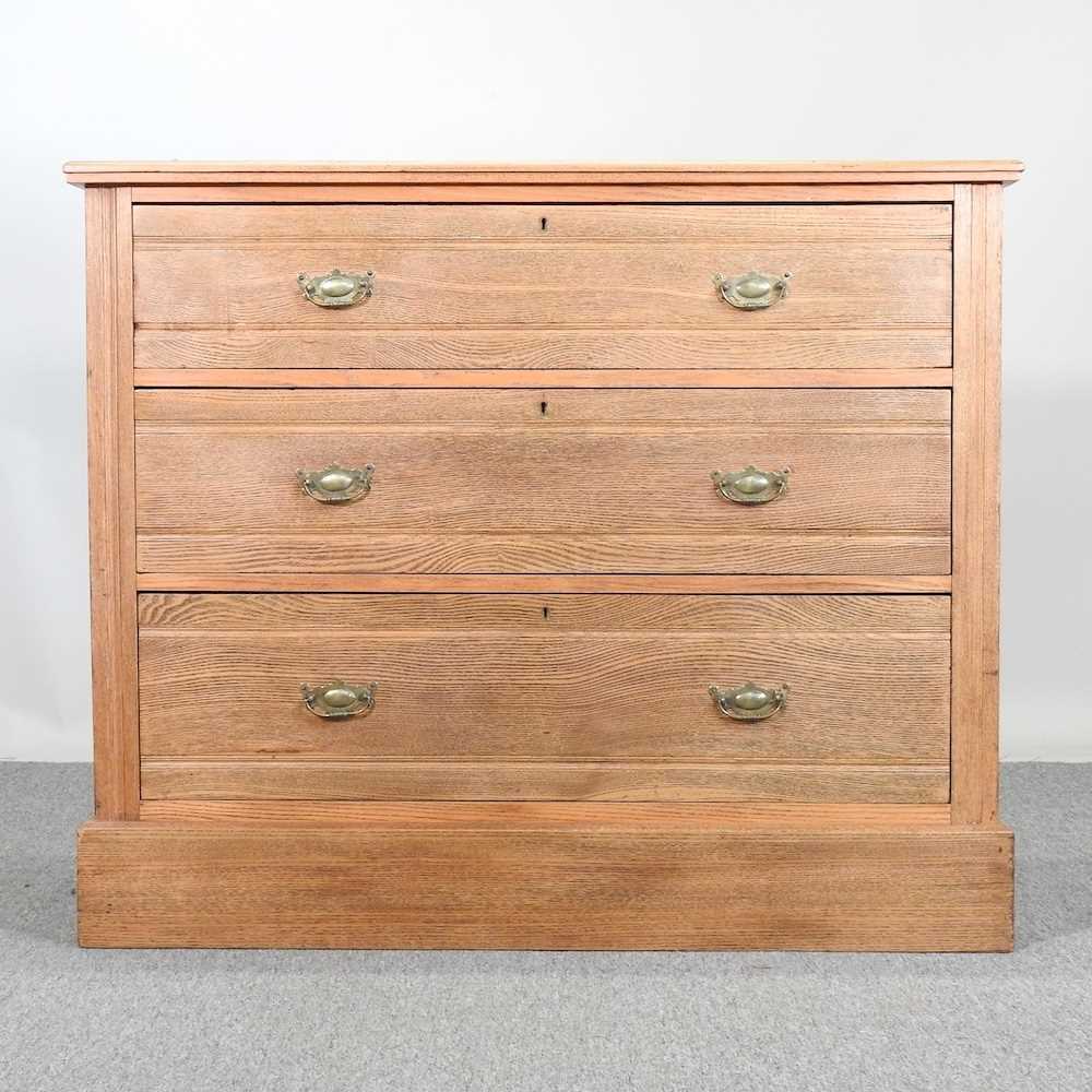 Lot 603 An Edwardian light ash chest of drawers