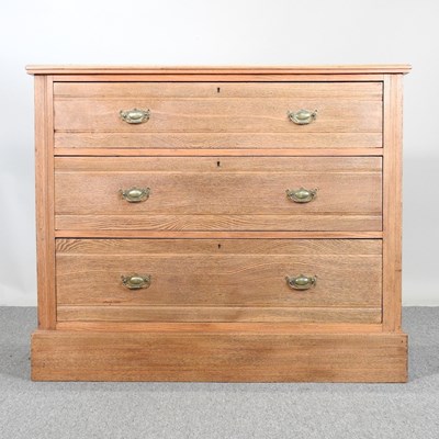 Lot 603 - An Edwardian light ash chest of drawers