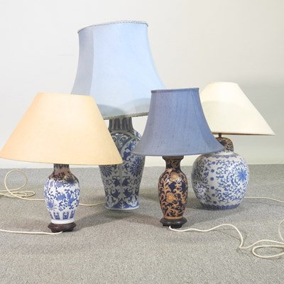 Lot 577 - A blue and white pottery table lamp and shade,...