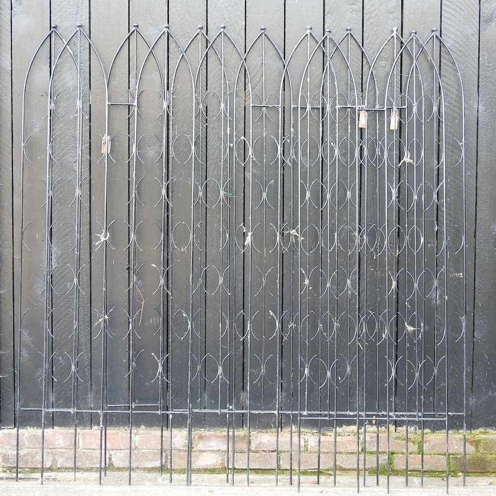 Lot 605 - A collection of black painted metal garden...