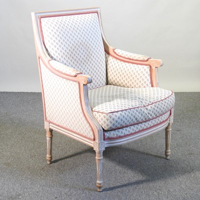 Lot 372 - A French style cream upholstered bergere chair,...