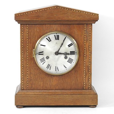 Lot 743 - An Edwardian walnut cased mantel clock, 32cm high