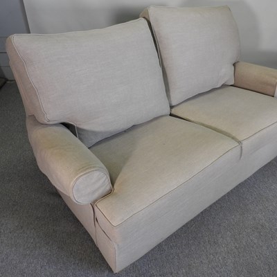 Lot 755 - A Multiyork cream upholstered two seater sofa