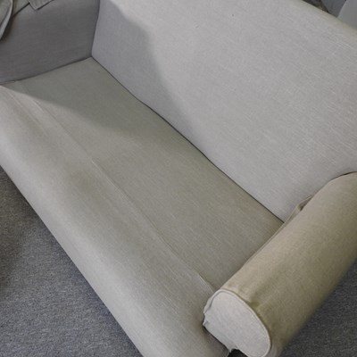 Lot 755 - A Multiyork cream upholstered two seater sofa