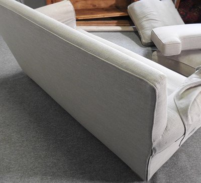 Lot 755 - A Multiyork cream upholstered two seater sofa