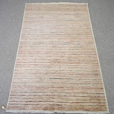 Lot 778 - A modern woollen rug, with all over coloured...