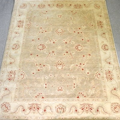 Lot 721 - A modern Ziegler carpet, with foliate designs...