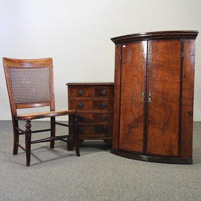 Lot 560 - A George III hanging corner cabinet, together...