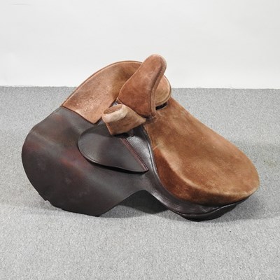 Lot 517 - A leather and suede side saddle