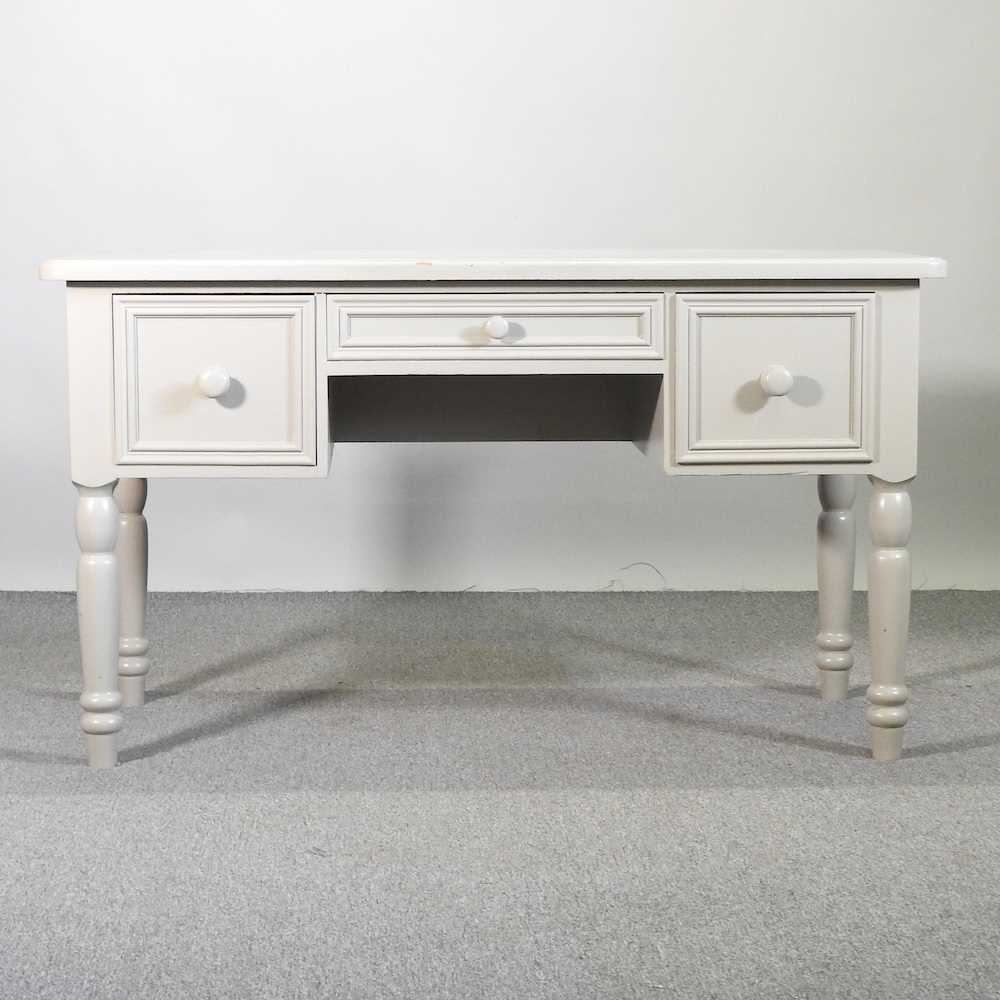 Lot 586 - A grey painted pine writing desk, containing