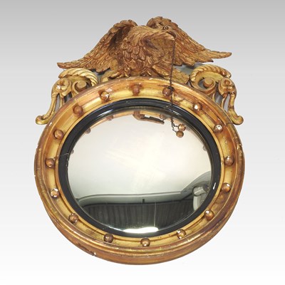 Lot 206 - A Regency carved pine and gilt gesso framed convex wall mirror
