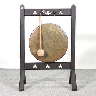 Lot 100 - A Victorian copper dinner gong, on a wooden...