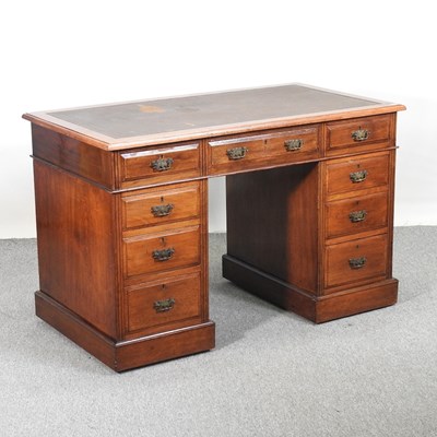 Lot 832 - An Edwardian pedestal desk, with an inset top,...