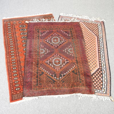 Lot 730 - A Bokhara rug, 160 x 96cm, on a red ground,...