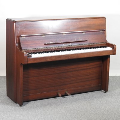 Lot 348 - A Welmar teak cased upright piano, 142cm wide