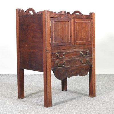 Lot 69 - A George III mahogany tray top commode, on...