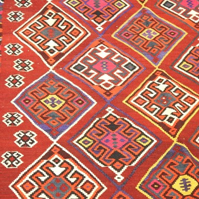 Lot 162 - A Persian kilim, with all over coloured...