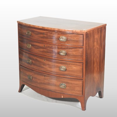Lot 210 - A 19th century mahogany and crossbanded bow front chest